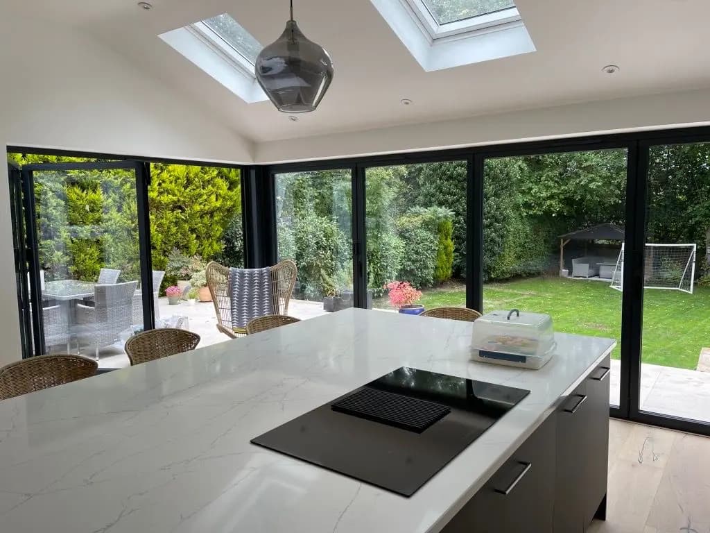 Completed rear kitchen extension overlooking a Surrey garden