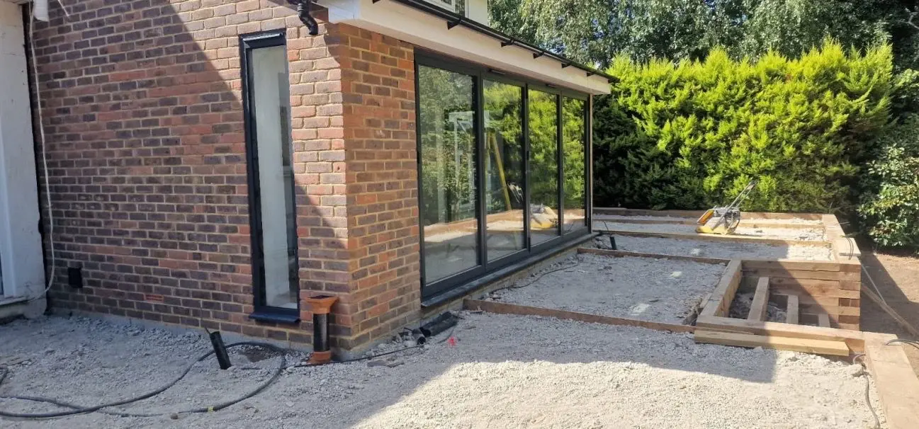 Brick extension and garden glazing under construction